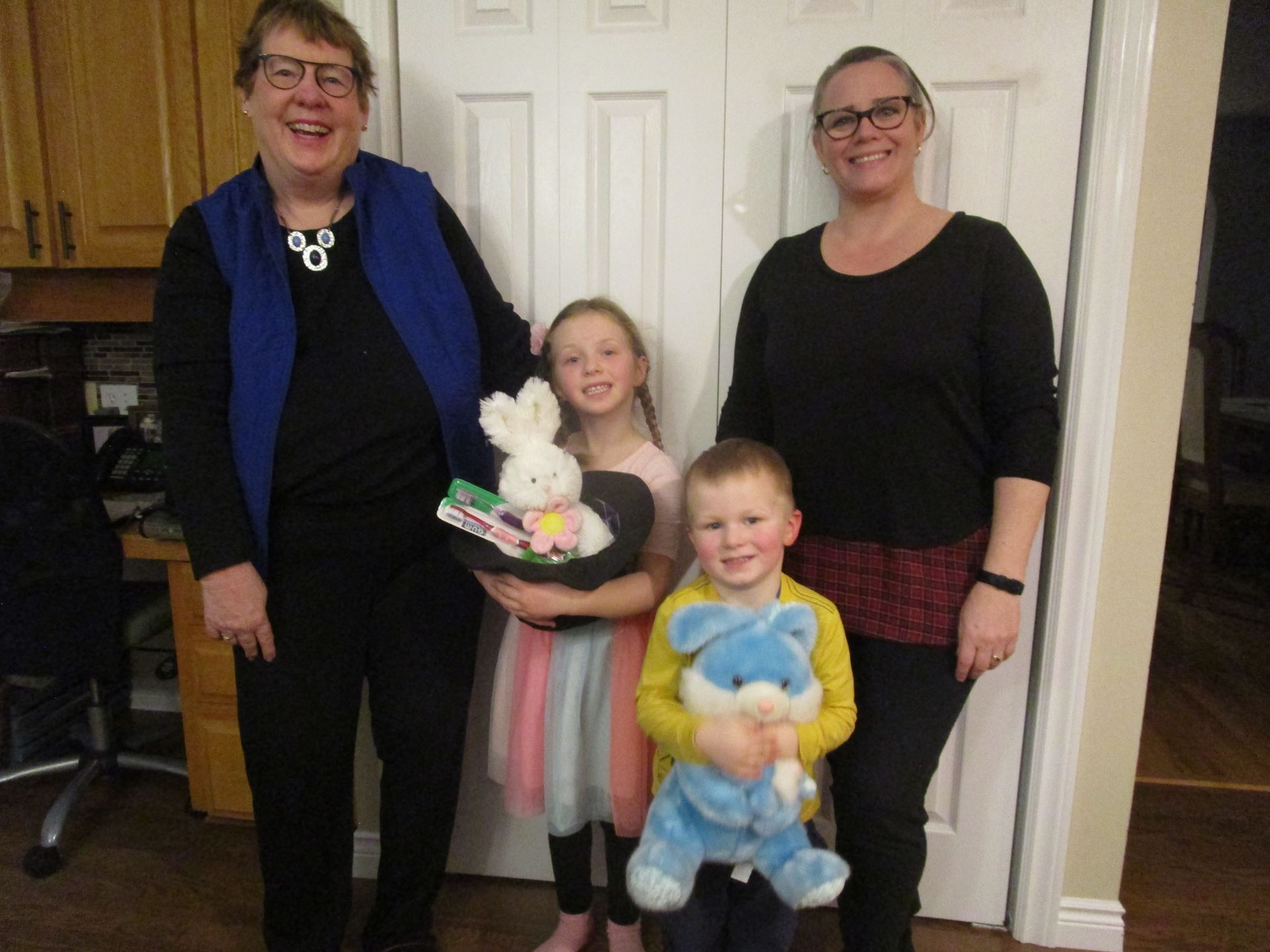 Marlene Bryenton with grandchildren Jaya and Brynn and illustrator Leanne Bowlan. 